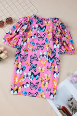 Chemisier violet imprimé papillon à volants et manches bouffantes noué à col en V-A WOMAN WE LOVE