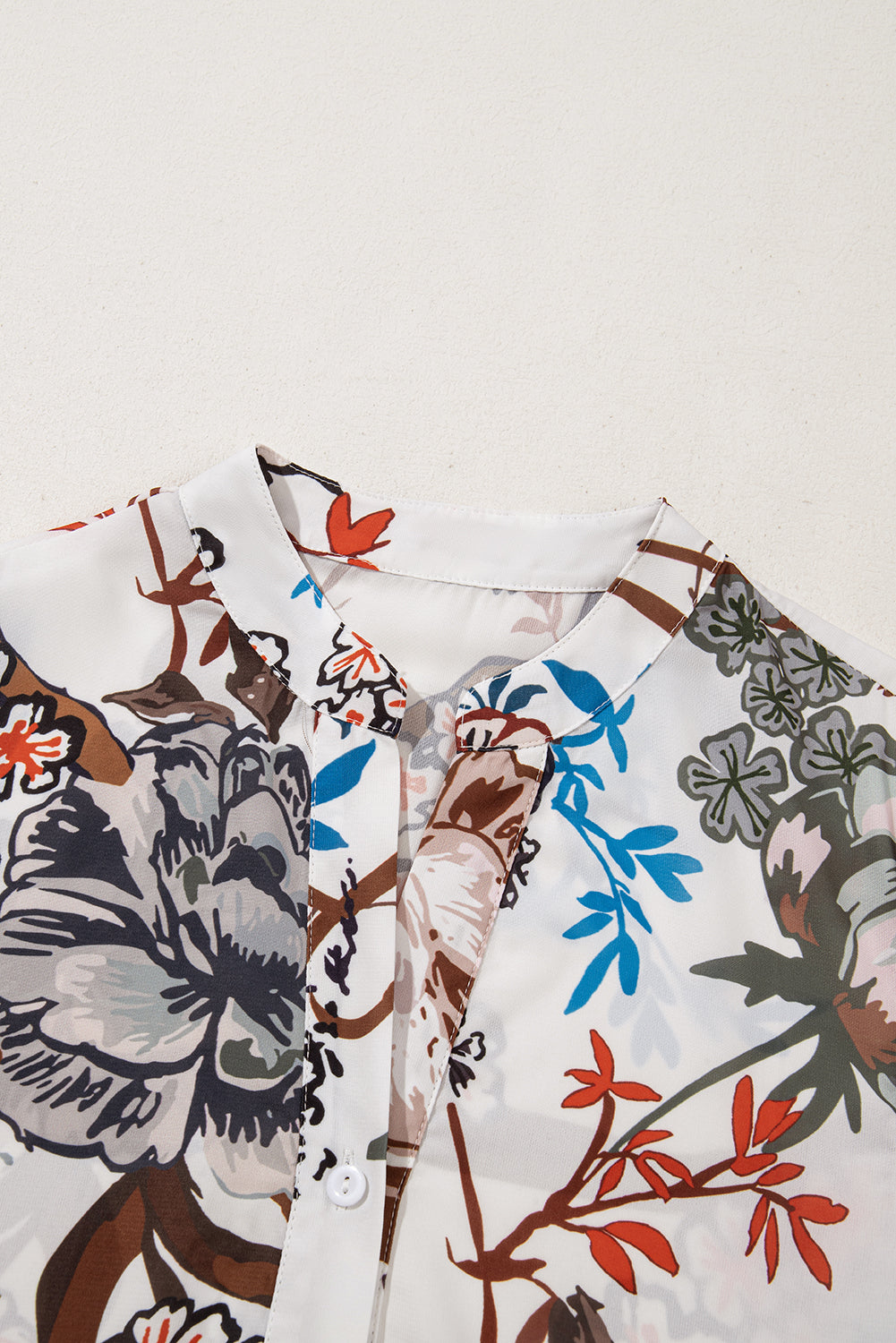 Chemise décontractée ample boutonnée à manches ballon à imprimé floral blanc-A WOMAN WE LOVE