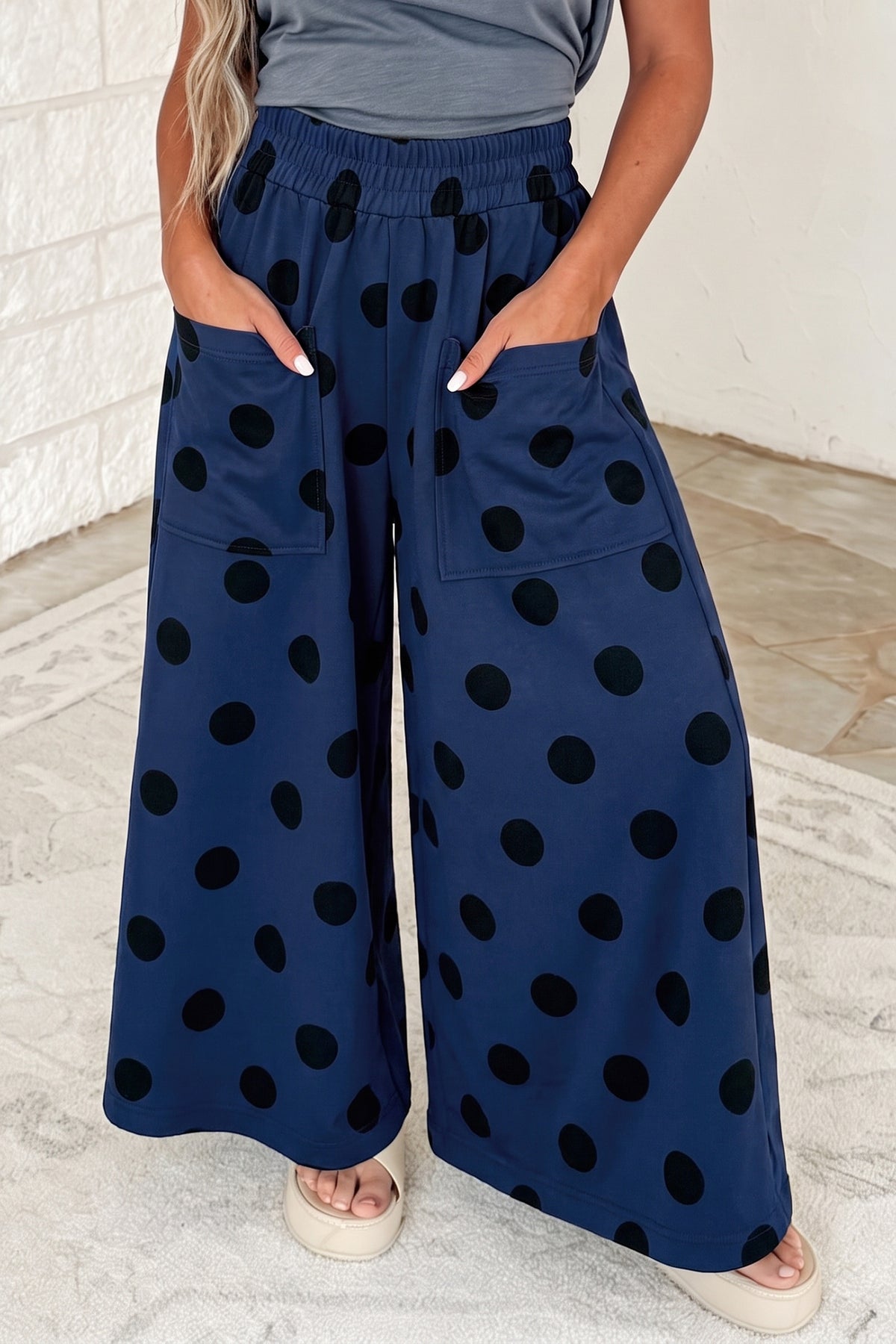 Pantalon large à pois, taille élastiquée et poches plaquées