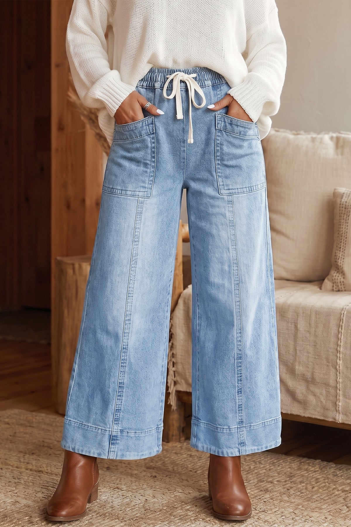 Jean large bleu à taille élastiquée, cordon et poches plaquées