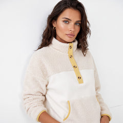 Beige fleece button-down sweatshirt with pocket and color block trim
