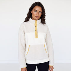 Beige fleece button-down sweatshirt with pocket and color block trim