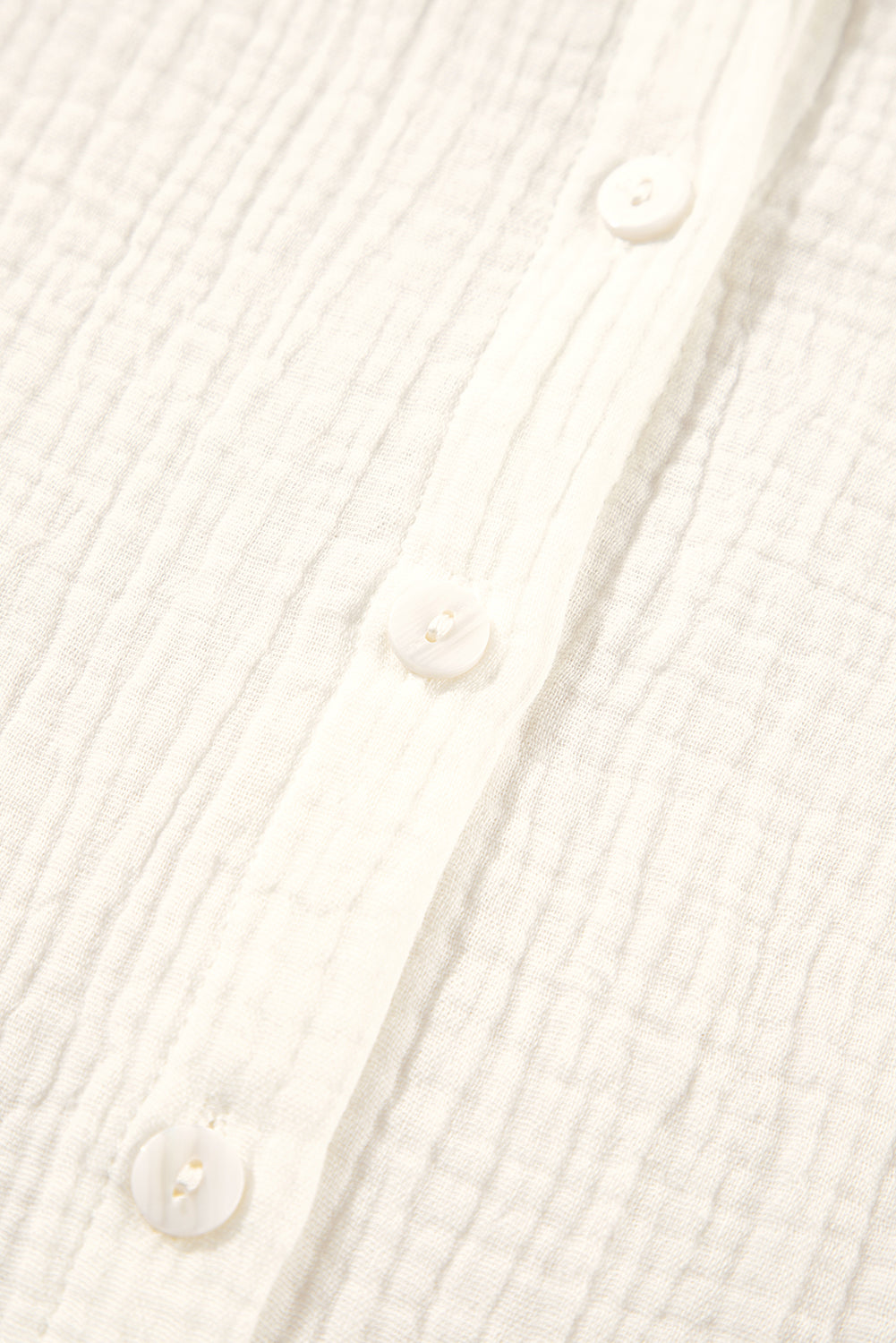 Chemise à col rond boutonnée texturée *-A WOMAN WE LOVE