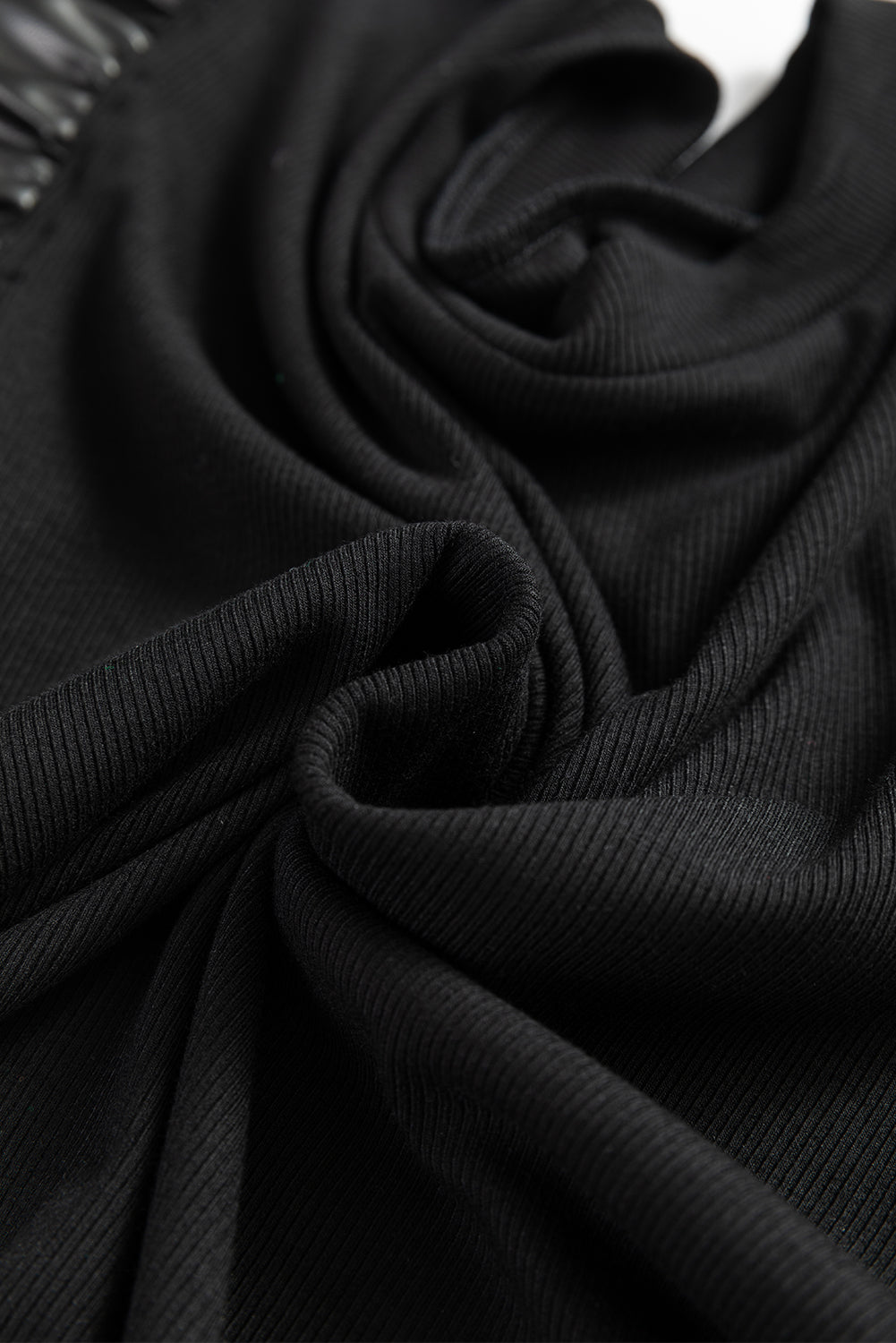 Chemisier en cuir noir à manches volantées *-A WOMAN WE LOVE