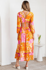 Robe longue orange à patchwork floral et dos ajouré à nouer