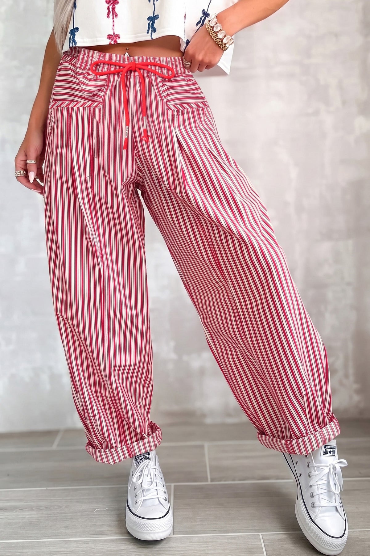 Pantalon ample rayé en coton à cordon et poches