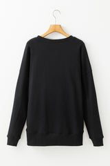 Sudadera suelta negra con bolsillos *