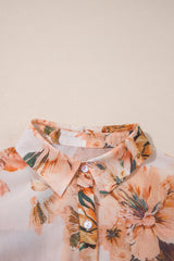 Chemise légère à manches bouffantes et motif floral orange