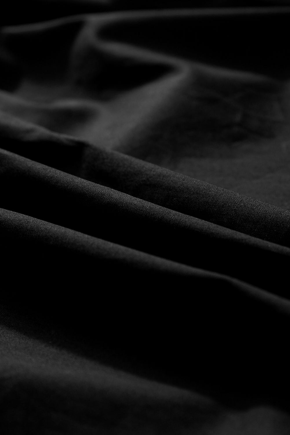 Chemise ample noire à manches bouffantes-A WOMAN WE LOVE