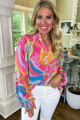 Blouse rose à imprimé abstrait et manches à volants boutonnée à col en V-A WOMAN WE LOVE