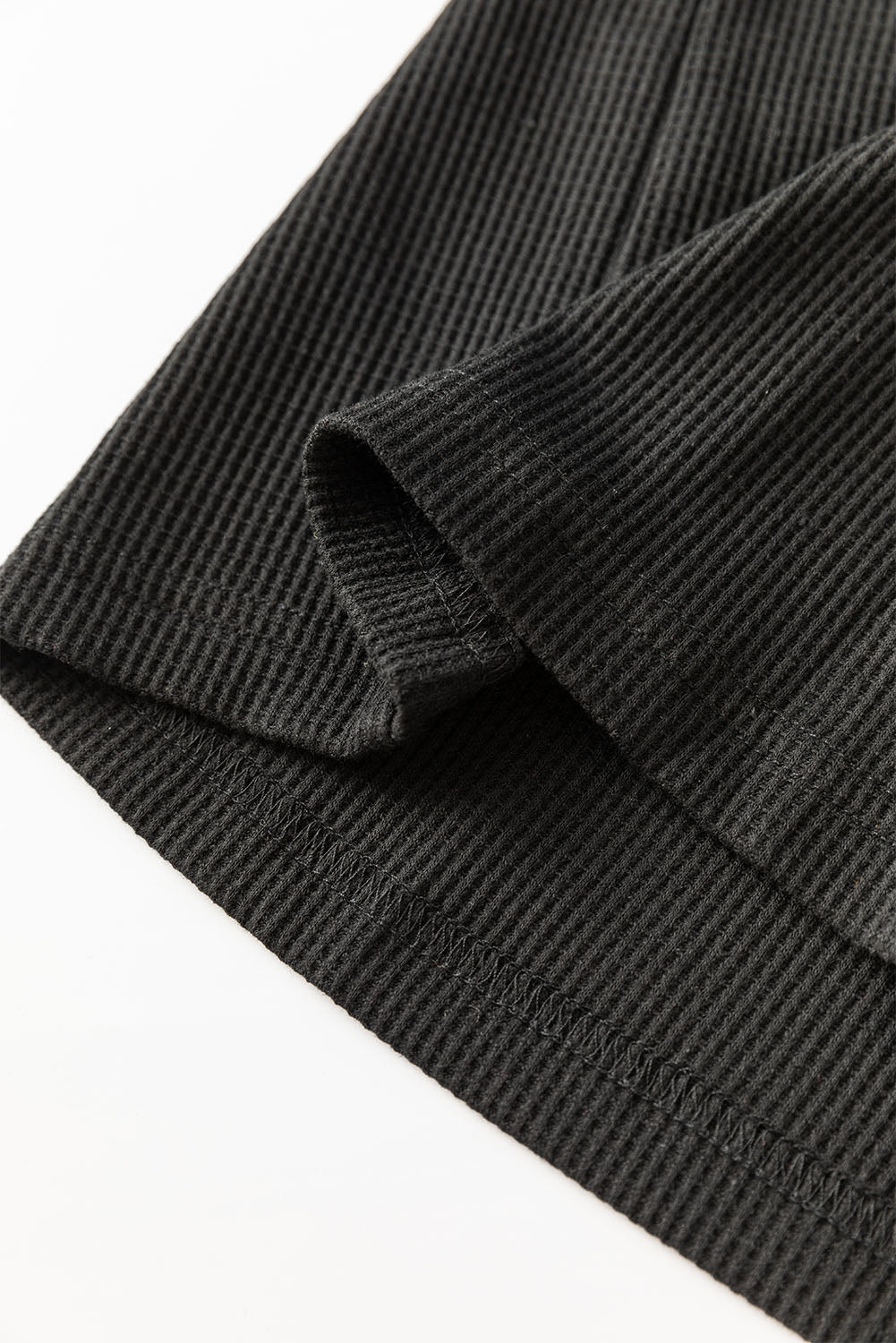 Blouse noire à manches lanternes et patchwork de sequins-A WOMAN WE LOVE