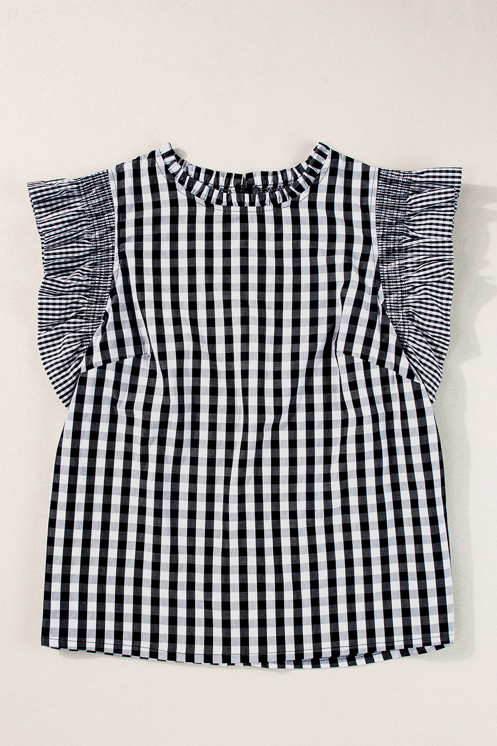 Chemisier noir à carreaux, manches à volants et col à volants-A WOMAN WE LOVE