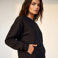 Sudadera suelta negra con bolsillos *