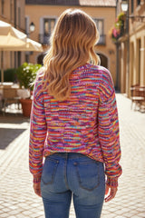 Pink cardigan open on the front with drooping shoulders and confetti