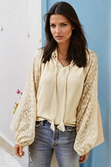 Beige blouse with split collar and puffy sleeves *