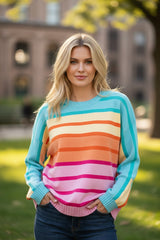 Loose-fitting yellow striped and gradient sweater with ribbed edges