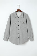 Grey buttoned jacket with plain textured flap pocket