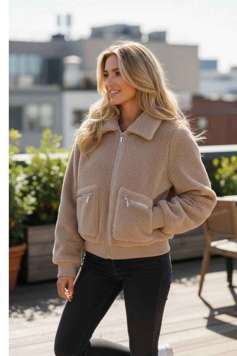 Light beige winter fluffy jacket with pockets and zipper