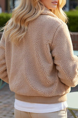 Light beige winter fluffy jacket with pockets and zipper
