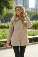 Veste matelassée boutonnée de couleur unie