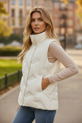 White quilted jacket with high collar and zipper