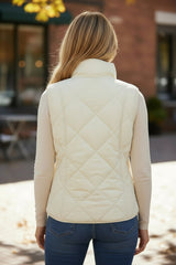 Beige quilted vest coat with high collar and buttoned pocket