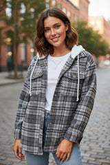 Loose-fitting jacket with contrasting hood and flap pockets in black plaid print