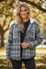 Loose-fitting jacket with contrasting hood and flap pockets in black plaid print