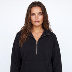 Sweat à capuche noir doublé en polaire, demi-zip et poche kangourou