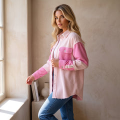 Veste rose en velours côtelé bicolore à coutures apparentes