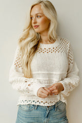 White solid color pointelle knit puff sleeve sweater