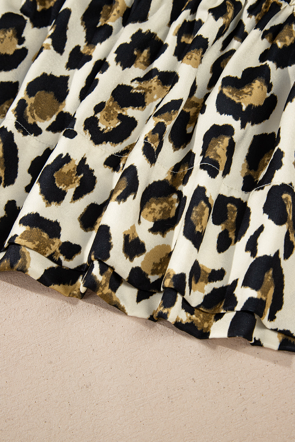 Chemisier péplum léopard abricot *-A WOMAN WE LOVE
