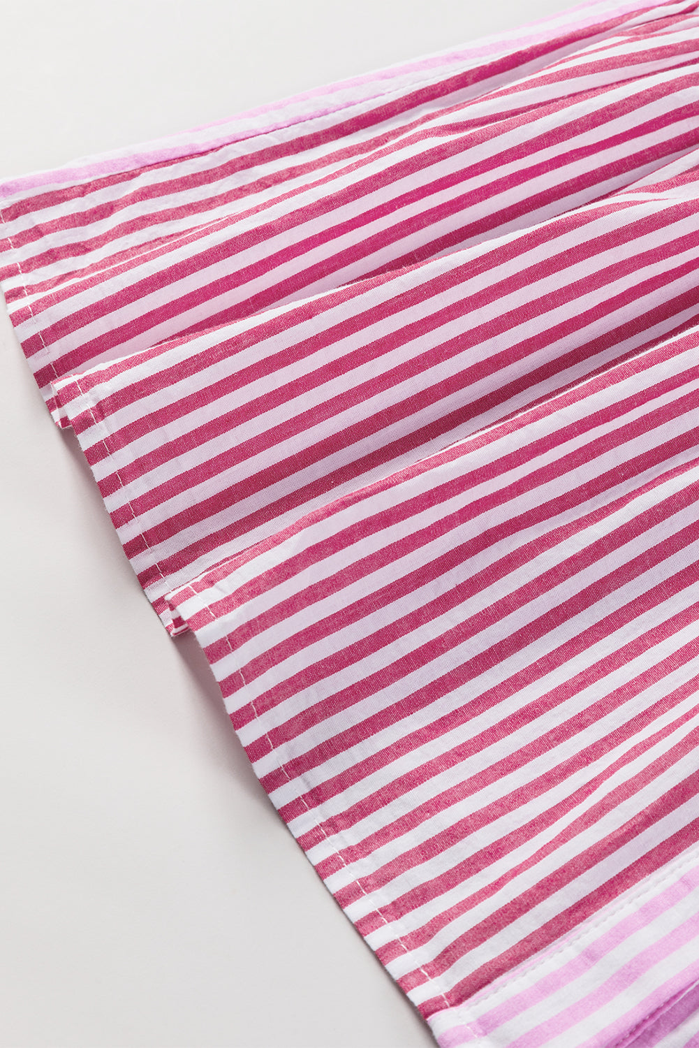 Chemise boutonnée à rayures roses et ourlet à volants en patchwork-A WOMAN WE LOVE