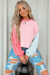 Haut à manches longues et épaules tombantes en patchwork color block à cordon rose