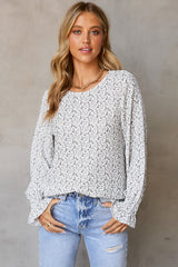 Blouse noire à manches  à volants-A WOMAN WE LOVE