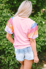 Pink top with puffy sleeves and color block stripes in Sequins