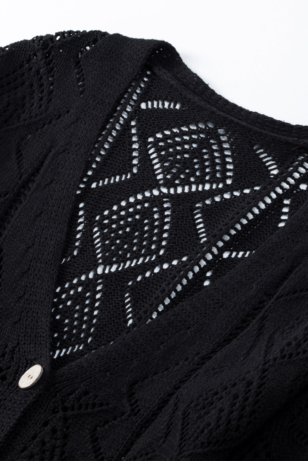 Cardigan en maille ajourée noir-A WOMAN WE LOVE