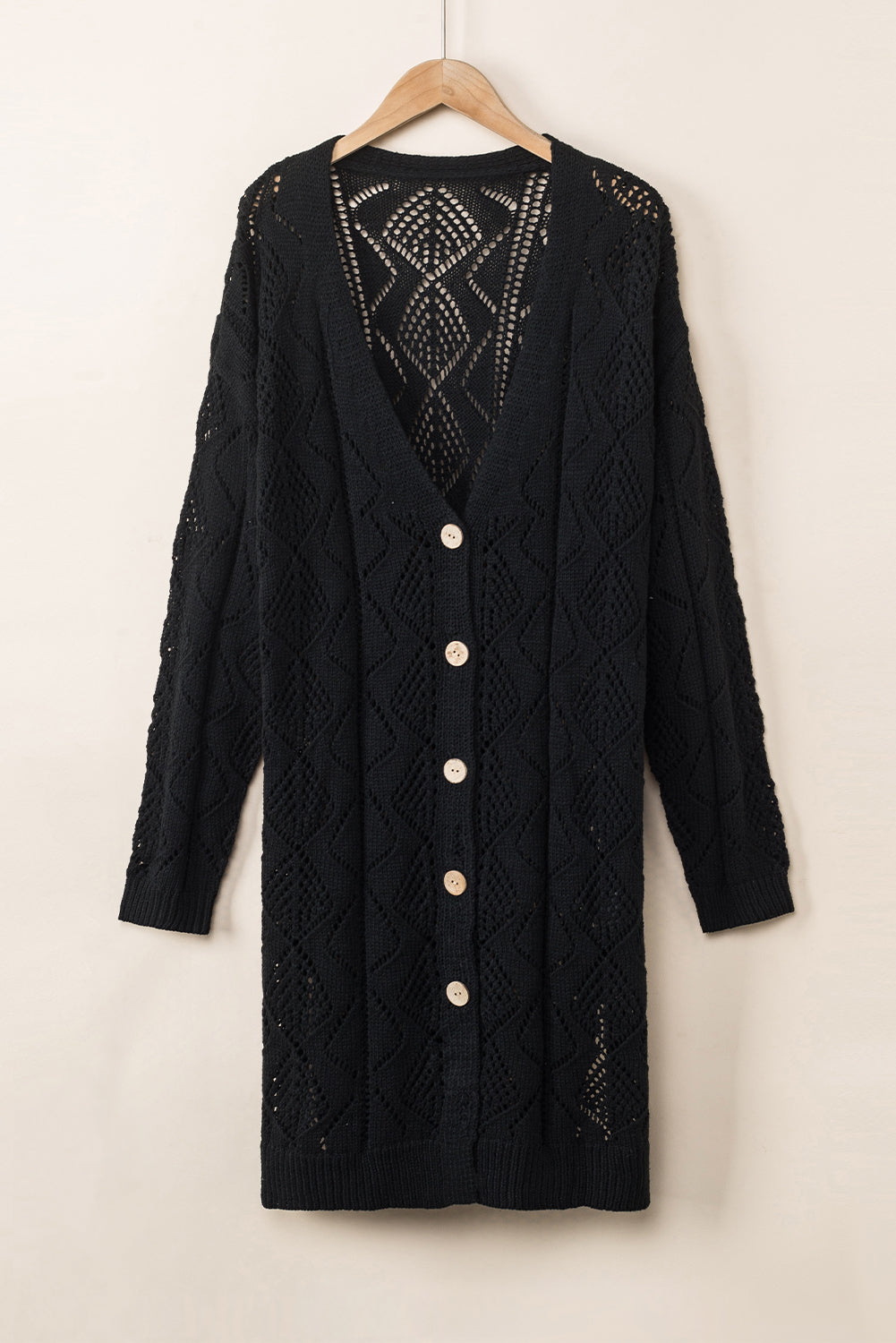 Cardigan en maille ajourée noir-A WOMAN WE LOVE