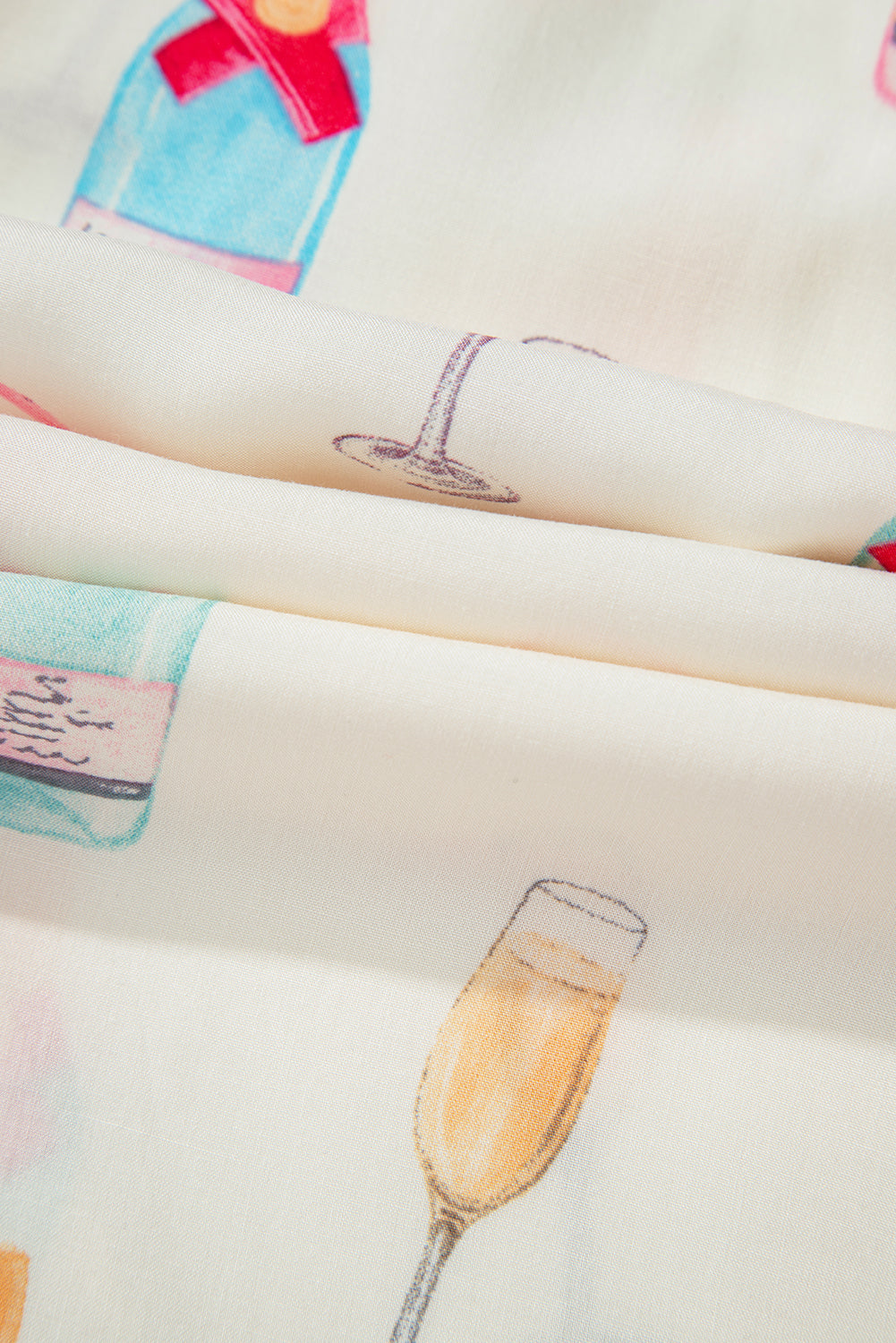 Ensemble pyjama deux pièces blanc à imprimé verre à vin et nœud papillon de Noël-A WOMAN WE LOVE