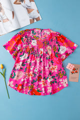 Blouse smockée à manches courtes et fleurs rose-A WOMAN WE LOVE