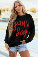 Sweat-shirt graphique noir à épaules tombantes Tinsel Game Day