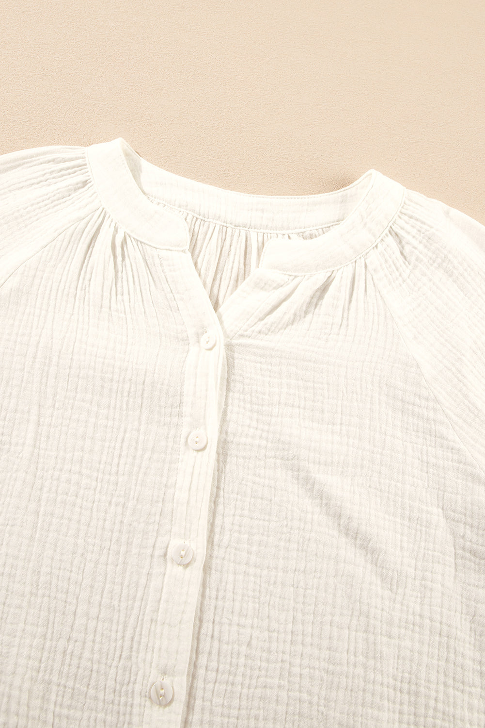 Chemise à col rond boutonnée texturée *-A WOMAN WE LOVE