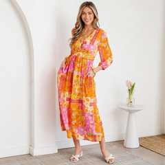 Robe longue orange à patchwork floral et dos ajouré à nouer